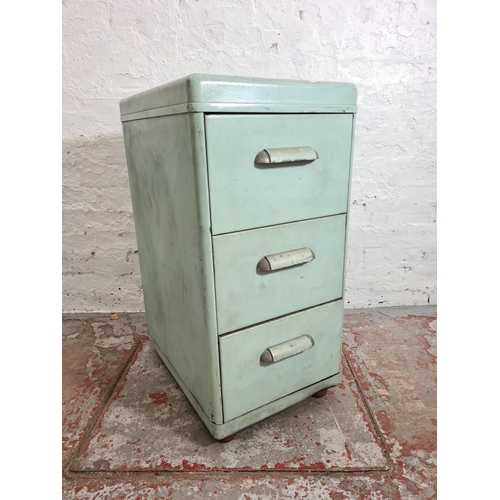 303 - A mid 20th century turquoise painted metal chest of three drawers - approx. 82cm high x 40cm wide x ... 