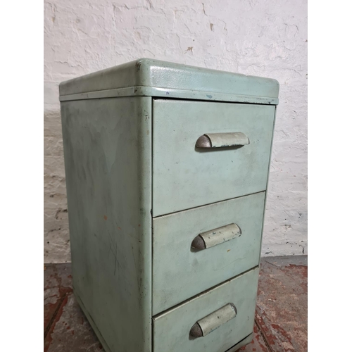 303 - A mid 20th century turquoise painted metal chest of three drawers - approx. 82cm high x 40cm wide x ... 