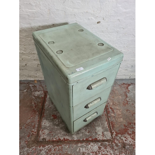 303 - A mid 20th century turquoise painted metal chest of three drawers - approx. 82cm high x 40cm wide x ... 