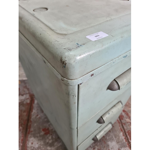 303 - A mid 20th century turquoise painted metal chest of three drawers - approx. 82cm high x 40cm wide x ... 