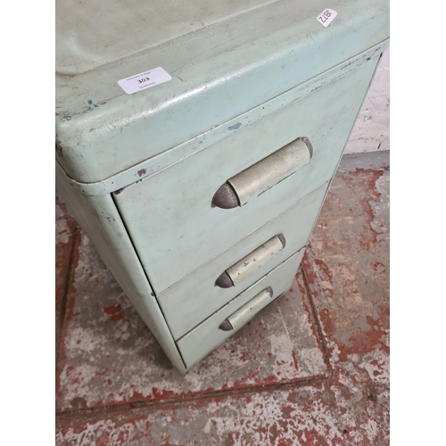 303 - A mid 20th century turquoise painted metal chest of three drawers - approx. 82cm high x 40cm wide x ... 