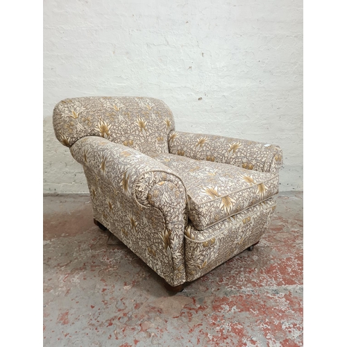 304 - A late Victorian library club armchair with William Morris & Co Snakeshead upholstery - approx. 77cm... 