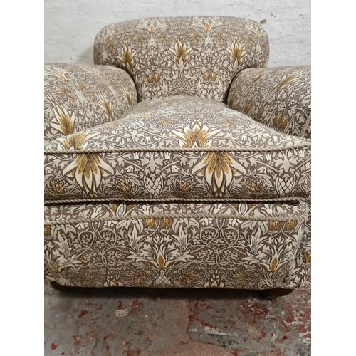 304 - A late Victorian library club armchair with William Morris & Co Snakeshead upholstery - approx. 77cm... 