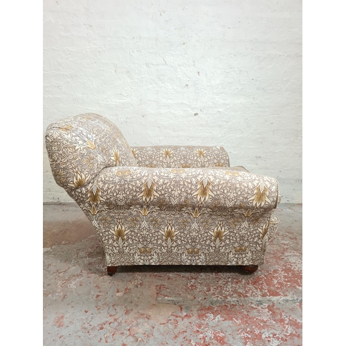 304 - A late Victorian library club armchair with William Morris & Co Snakeshead upholstery - approx. 77cm... 