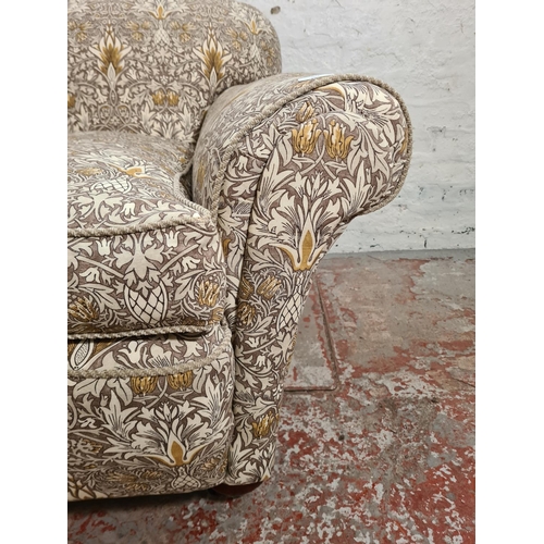 304 - A late Victorian library club armchair with William Morris & Co Snakeshead upholstery - approx. 77cm... 