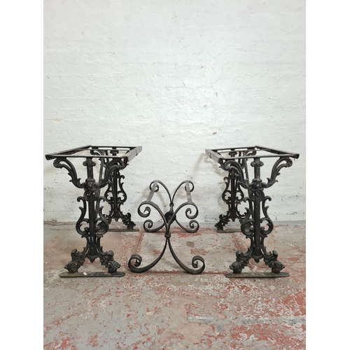 306 - Three black painted iron table bases, two Victorian cast - approx. 69cm high x 42cm wide x 70cm long... 