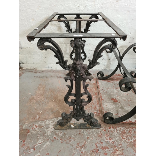 306 - Three black painted iron table bases, two Victorian cast - approx. 69cm high x 42cm wide x 70cm long... 