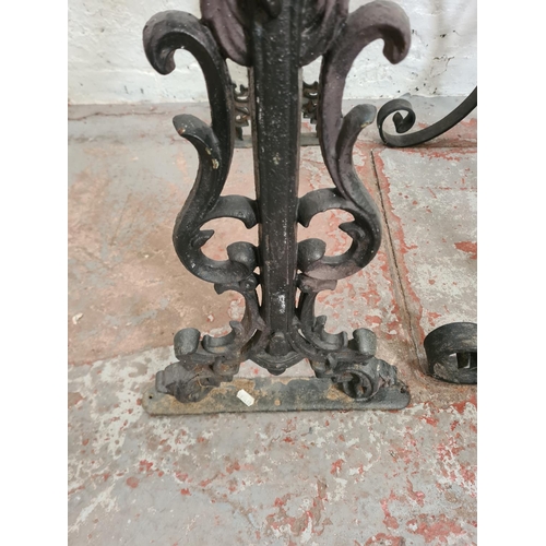 306 - Three black painted iron table bases, two Victorian cast - approx. 69cm high x 42cm wide x 70cm long... 