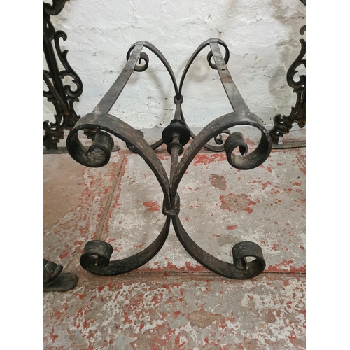 306 - Three black painted iron table bases, two Victorian cast - approx. 69cm high x 42cm wide x 70cm long... 