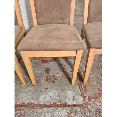 310 - Four modern beech and brown upholstered dining chairs