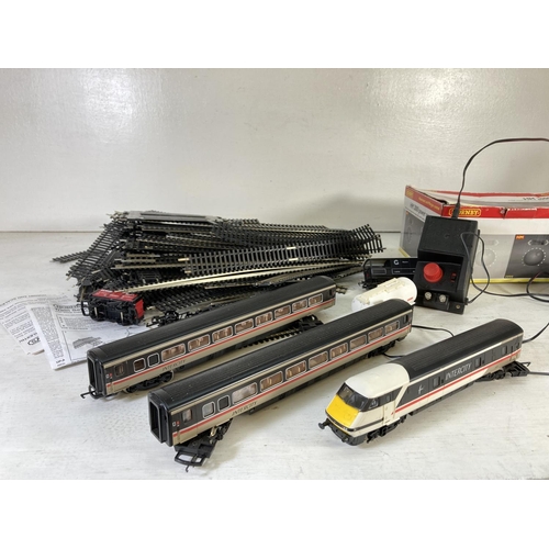 101 - A collection of Hornby model railway accessories to include boxed HM 2000 R8012 power controller, R.... 