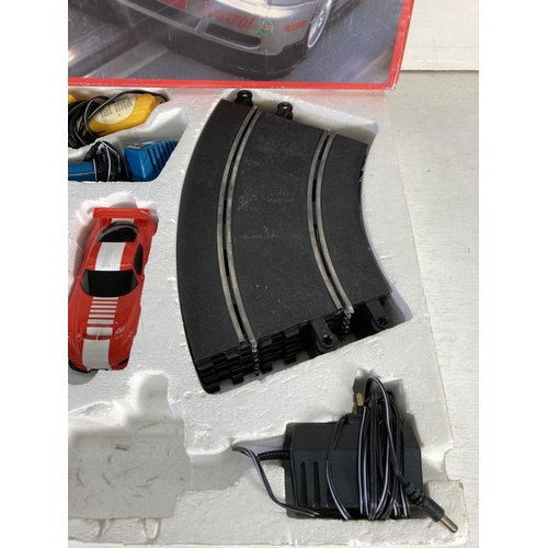 103 - A boxed Hornby Scalextric C.1015P Audi racing set