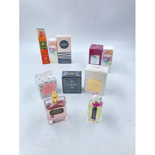 116 - A large collection of assorted women's perfume