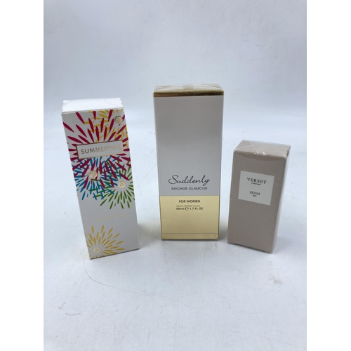 117 - A large collection of various boxed women's perfume