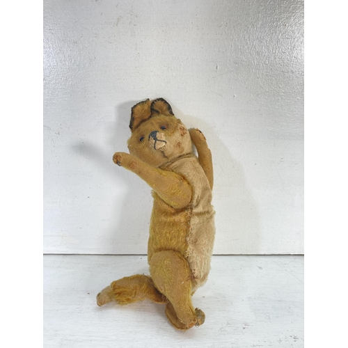 74 - An early 20th century straw filled toy fox - approx. 33cm long