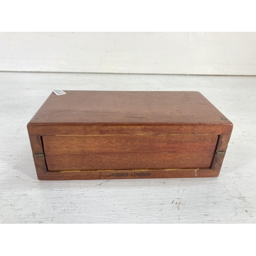 76 - A mid 20th century Jaques of London hardwood cased portable chess set