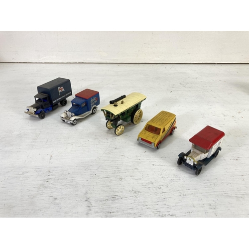 83 - A collection of assorted vintage diecast model vehicles to include Lledo Models of Days Gone, Oxford... 