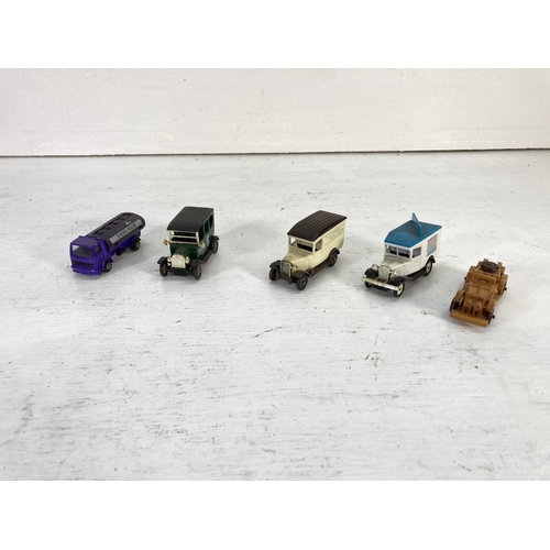 83 - A collection of assorted vintage diecast model vehicles to include Lledo Models of Days Gone, Oxford... 