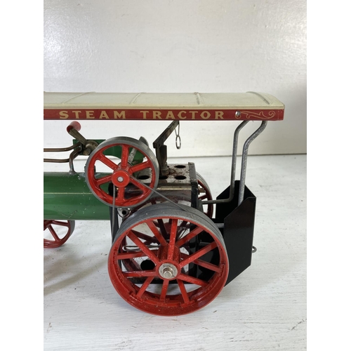 88 - A boxed 1970s Mamod TE1A model steam tractor with accessories