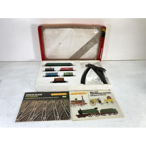 94 - A collection of boxed 'OO' gauge electric model locomotives to include Tri-ang R.357, Hornby, track ... 