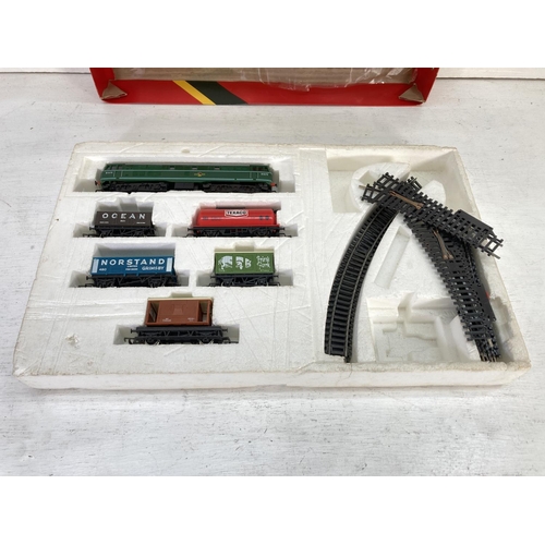 94 - A collection of boxed 'OO' gauge electric model locomotives to include Tri-ang R.357, Hornby, track ... 