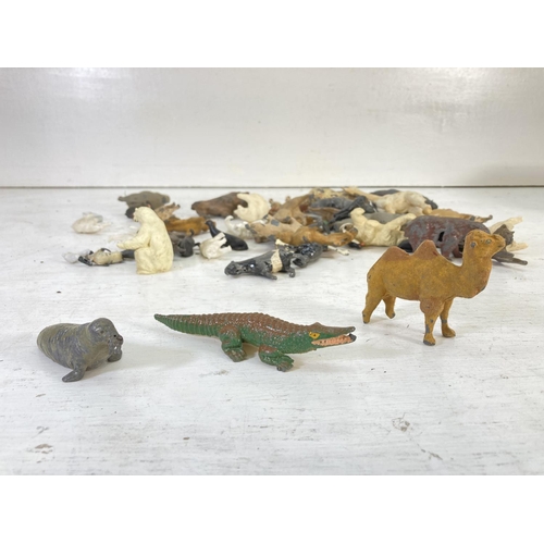 97 - A collection of vintage animal toy figurines to include hand painted lead, Britains Ltd etc.