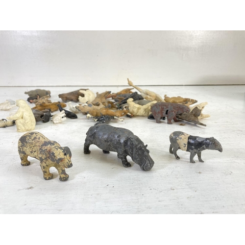 97 - A collection of vintage animal toy figurines to include hand painted lead, Britains Ltd etc.