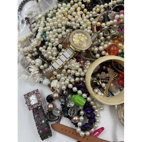 134 - A large collection of assorted costume jewellery to include quartz wristwatches, necklaces, bracelet... 