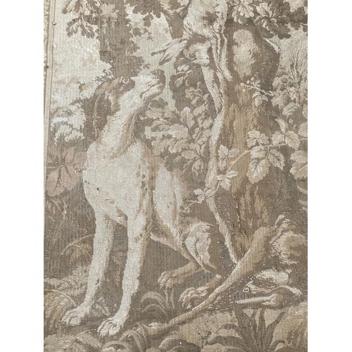 142 - An antique French tapestry of a hunting scene - approx. 188cm long x 123cm wide