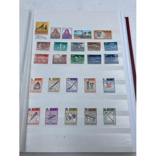 164 - Three stamp albums containing various worldwide stamps