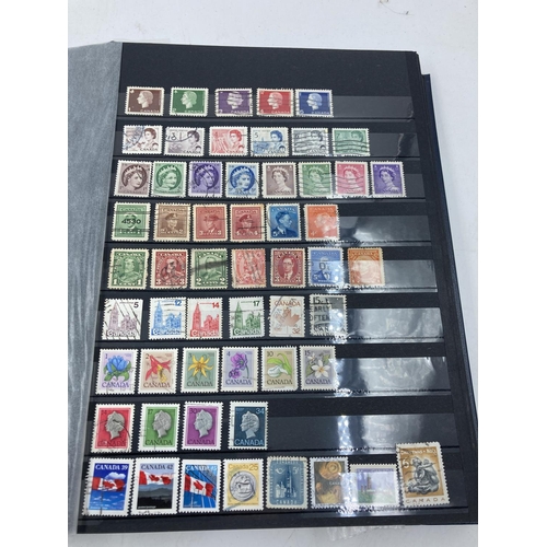 165 - A stamp album containing a collection of various world wide stamps