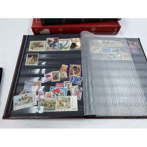 166 - Four stamp albums containing a collection of various world wide stamps together with one box contain... 