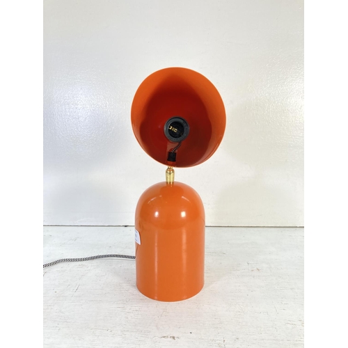 173 - A mid 20th century style orange table lamp - approx. 35.5cm high