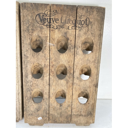 176 - A pair of vintage oak Veuve Clicquot 9 section wall mountable Champagne bottle racks - approx. 59.5c... 