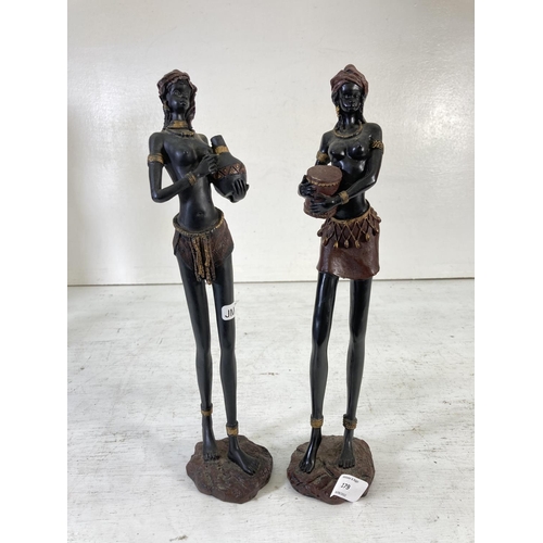 179 - Five resin and wooden African tribal figurines - tallest approx. 36cm high