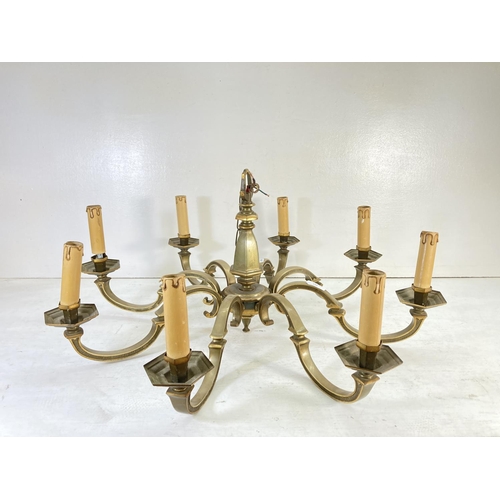 180 - A Victorian style brass eight section electric converted chandelier - approx. 34cm high x 74cm diame... 