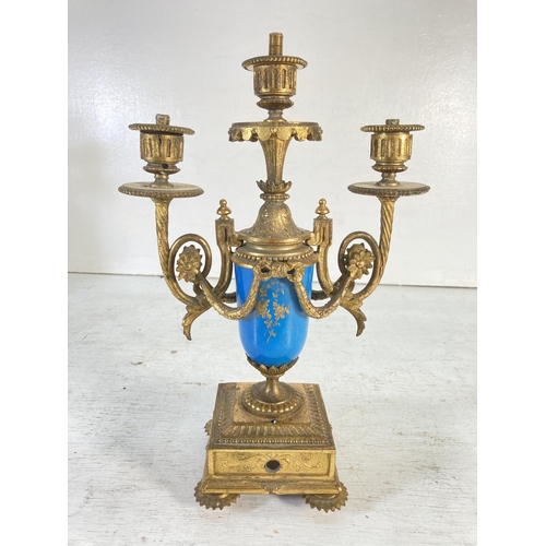 195 - A pair of Sevres style gilt metal and hand painted porcelain three branch candelabras - approx. 32cm... 