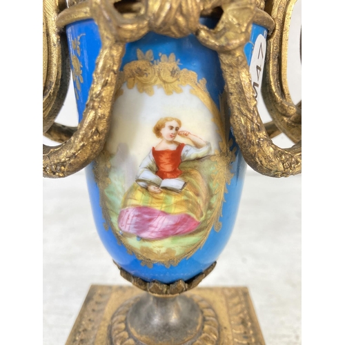 195 - A pair of Sevres style gilt metal and hand painted porcelain three branch candelabras - approx. 32cm... 