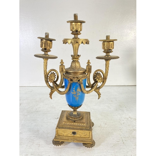 195 - A pair of Sevres style gilt metal and hand painted porcelain three branch candelabras - approx. 32cm... 