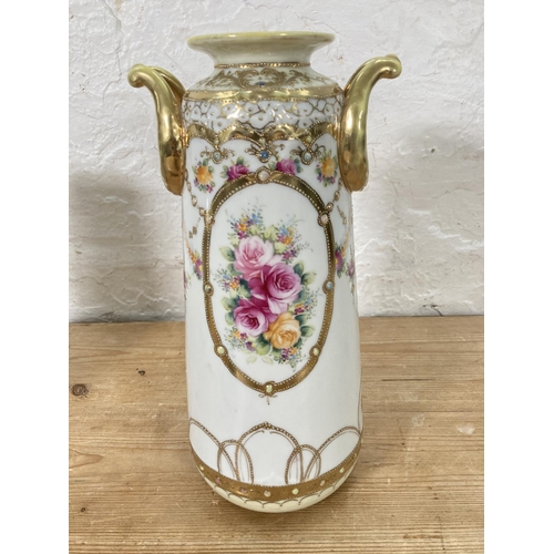 54 - A pair of Noritake hand painted porcelain twin handled vases with gilt decoration - approx. 30.5cm h... 
