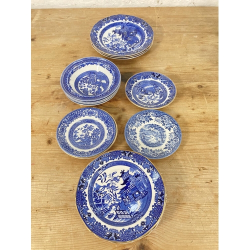 56 - A large collection of Burleigh Ware Willow pattern ceramics to include lidded ginger jar, coffee pot... 