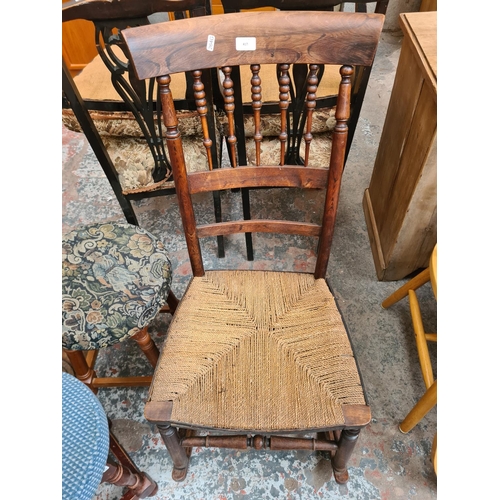 417 - Four pieces of furniture, 19th century rosewood and elm rocking chair with rush seat, two upholstere... 