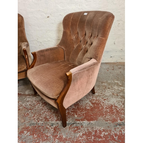 418 - A pair of Parker Knoll model PK 1022-27 brown upholstered armchairs - approx. 86cm high x 66cm wide ... 