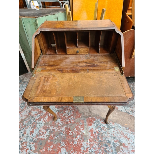 419 - A walnut bureau with two drawers, fall front and cabriole supports - approx. 100cm high x 69cm wide ... 