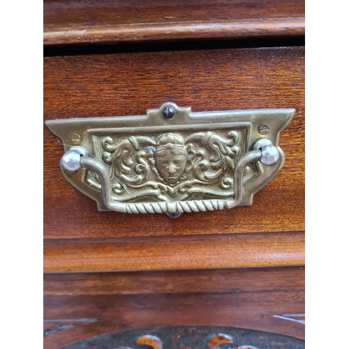 422 - An Edwardian mahogany sideboard with two drawers and two carved panel doors - approx. 93cm high x 12... 