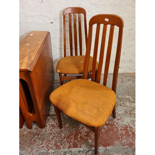 424 - A 1970s teak drop leaf gate leg dining table and four matching chairs - approx. 74cm high x 83cm wid... 