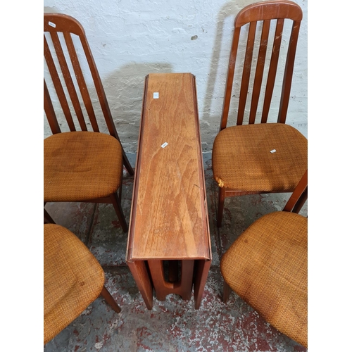 424 - A 1970s teak drop leaf gate leg dining table and four matching chairs - approx. 74cm high x 83cm wid... 