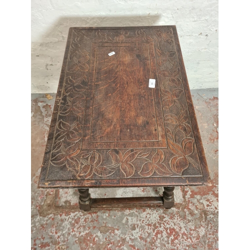 425 - A 19th century carved oak rectangular joint side table with leaf design - approx. 65cm high x 66cm w... 