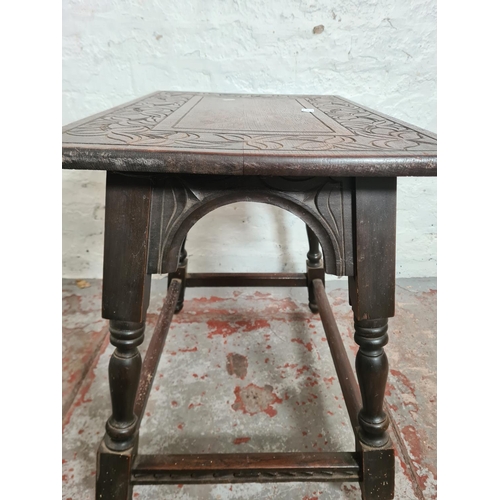 425 - A 19th century carved oak rectangular joint side table with leaf design - approx. 65cm high x 66cm w... 