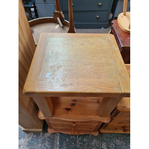 432 - Four pieces of furniture, two pine bedside chests of three drawers, one solid oak side table and one... 